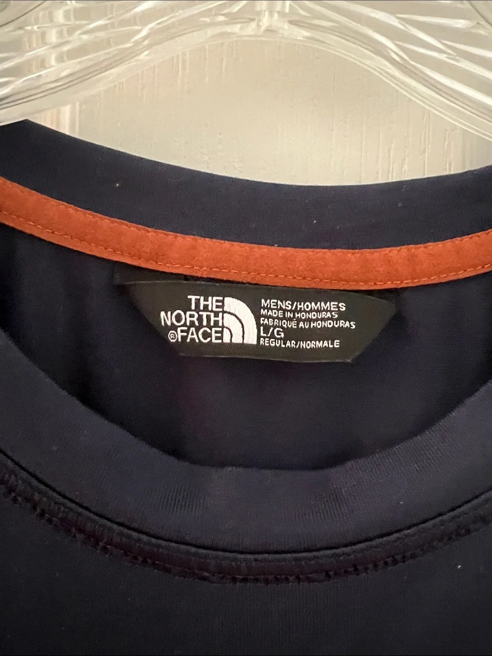 The North Face Men’s Short Sleeve Tee in Navy with Orange Logo